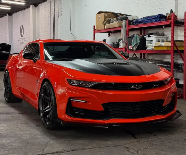 showcasing dark window tinting and a glossy, reflective finish