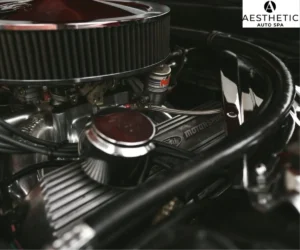 Detailed view of a polished classic Ford engine showing clean chrome accents and valve covers.